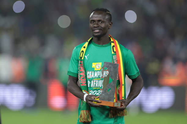 Sadio Mane poses with the player of the tournament award after winning the AFCON 2021 final match between Senegal and Egypt at Stade d'Olembe on February 6, 2022.