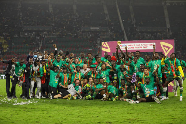 Senegal players celebrate with the trophy after winning the AFCON 2021 final against Egypt at the Paul Biya 'Olembe' Stadium on 06 February 2022.
