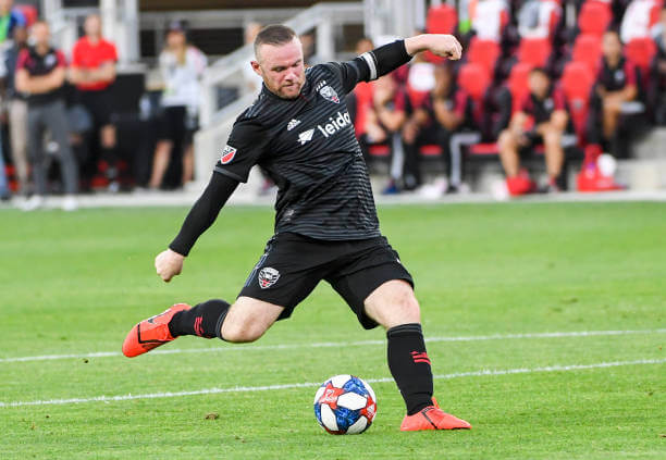 Top 10 Players to have played in the MLS: Wayne Rooney in action for D.C. United during an MLS game.