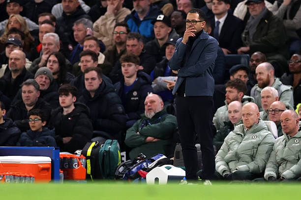 Chelsea vs PSG Review: Liam Rosenior looks on during the UEFA Champions League 2025/26 Round of 16 Second Leg match between Chelsea and PSG at Stamford Bridge on March 17, 2026.