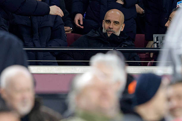 West Ham vs Manchester City Review: Pep Guardiola sits in the stands during the Premier League football match between West Ham and Manchester City at the London Stadium on March 14, 2026.