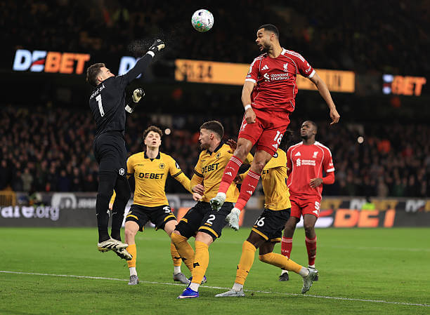 Wolves vs Liverpool Review: Jose Sa punches the ball away from Cody Gakpo during the Premier League match between Wolves and Liverpool at Molineux on March 4, 2026.
