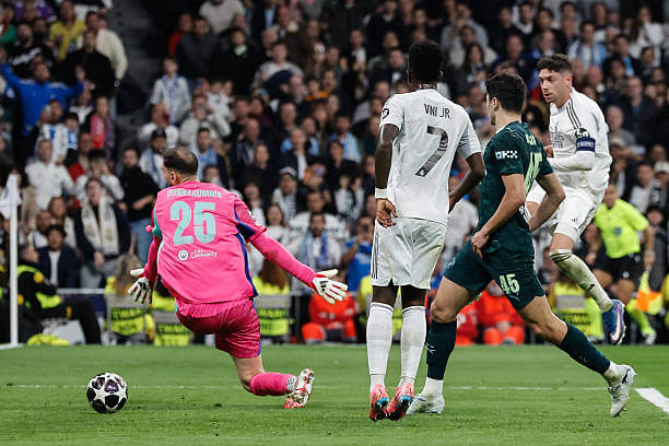 Real Madrid vs Manchester City Review: Federico Valverde scores his third goal of the game during the UEFA Champions League 2025/26 Round of 16 First Leg match between Real Madrid and Manchester City at the Santiago Bernabeu on March 11, 2026.