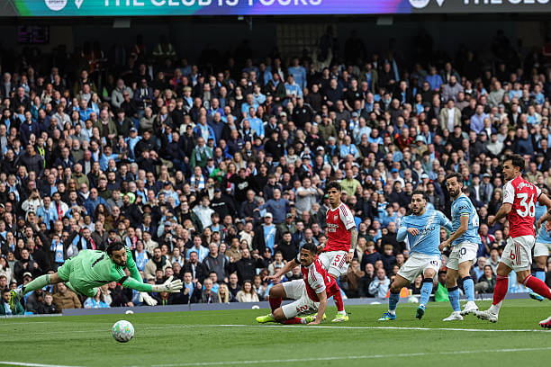 Manchester City vs Arsenal Review: Rayan Cherki scores during the Premier League match between Manchester City and Arsenal at the Etihad Stadium on April 19, 2026.