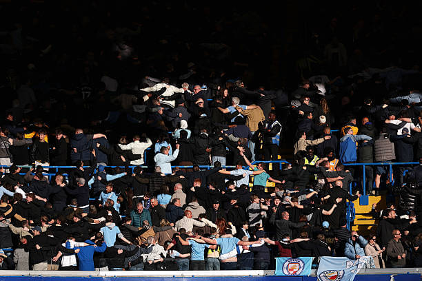 Chelsea vs Manchester City Review: Manchester City fans conduct the Poznan after Jeremy Doku scores during the Premier League match between Chelsea and Manchester City at Stamford Bridge on April 12, 2026.