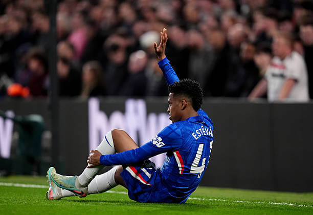Chelsea vs Manchester United Review: Estevao holds his leg after picking up an injury during the Premier League match between Chelsea and Manchester United at Stamford Bridge on April 18, 2026.