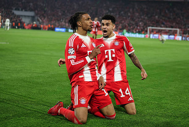 Champions League Roundup, Quarterfinals: Michael Olise celebrates his goal with Luis Diaz during the UEFA Champions League 2025/26 Quarter-Final Second Leg match between Bayern Munich and Real Madrid at the Allianz Arena on April 15, 2026.