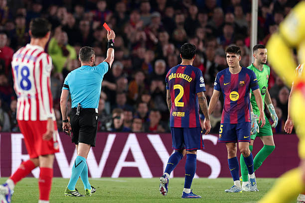 Barcelona vs Atletico Madrid Review: Pau Cubarsi receives a red card from Referee Istvan Kovacs during the UEFA Champions League quarter final first leg match between Barcelona and Atletico Madrid at the Camp Nou on April 8, 2026.