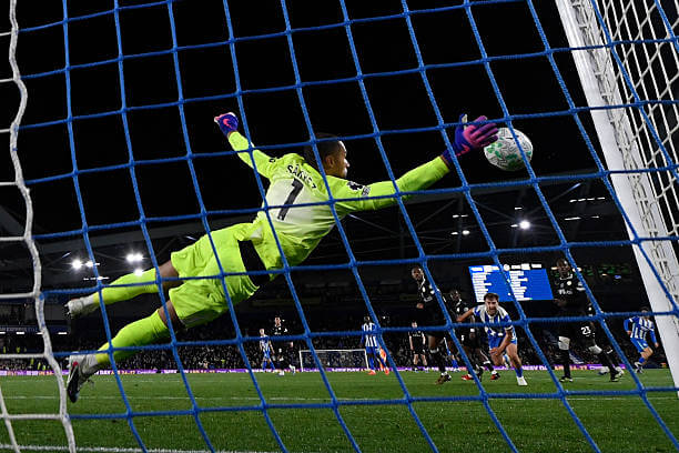 Brighton vs Chelsea Review: Robert Sanchez makes a save during the Premier League match between Brighton and Chelsea at the Amex Stadium on April 21, 2026.