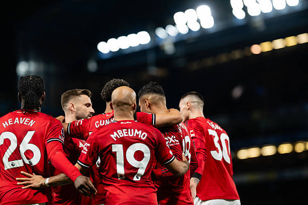 Chelsea vs Manchester United Review: Manchester United players celebrate during the Premier League match between Chelsea and Manchester United at Stamford Bridge on April 18, 2026.