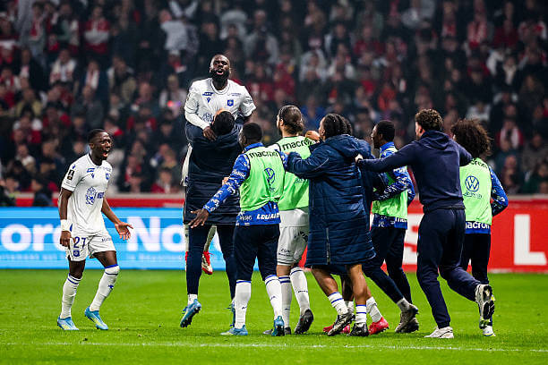 Ligue 1 Roundup, Matchday 34: Auxerre players celebrate during the Ligue 1 match between Lille and Auxerre at Stade Pierre Mauroy on May 17, 2026.