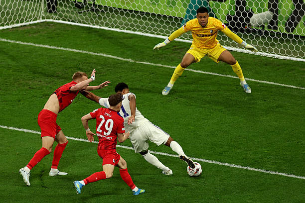 Freiburg vs Aston Villa Review: Ollie Watkins dribbles past Philipp Lienhart and Philipp Treu as Noah Atubolu looks on during the UEFA Europa League final between Freiburg and Aston Villa at Besiktas Park on May 20, 2026.