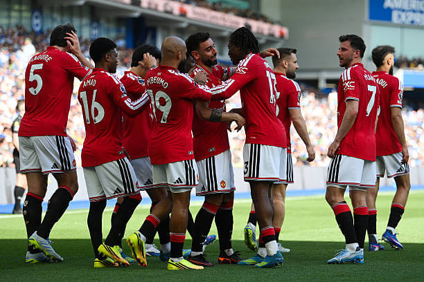 Premier League Roundup, Matchday 38: Patrick Dorgu celebrates his goal with Bruno Fernandes and other teammates during the Premier League match between Brighton and Manchester United at the Amex Stadium on May 24, 2026.