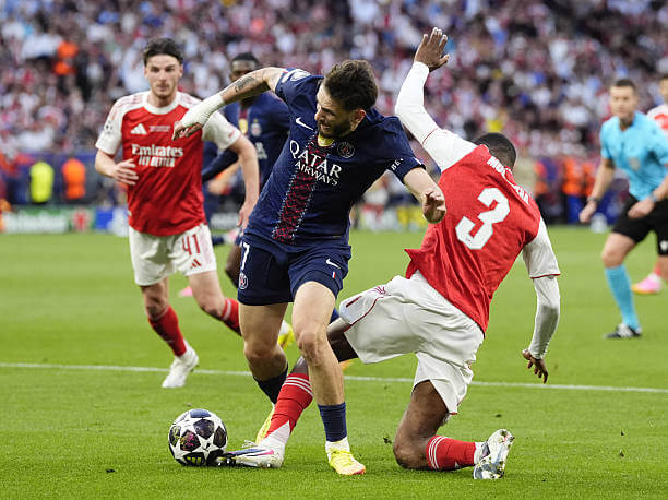 PSG vs Arsenal Review: Khvicha Kvaratskhelia is fouled by Cristhian Mosquera resulting in a penalty during the UEFA Champions League Final match between PSG and Arsenal at the Puskas Arena on May 30, 2026.