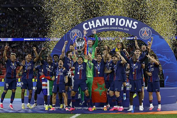 PSG vs Arsenal Review: PSG players celebrate with the UCL trophy after the UEFA Champions League Final match between PSG and Arsenal at the Puskas Arena on May 30, 2026.