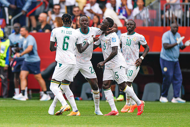 2026 FIFA World Cup Roundup, Group Stages: Papa Gueye celebrates his goal with his teammates during the FIFA World Cup 2026 Group I match between Senegal and Iraq at Toronto Stadium on June 26, 2026.