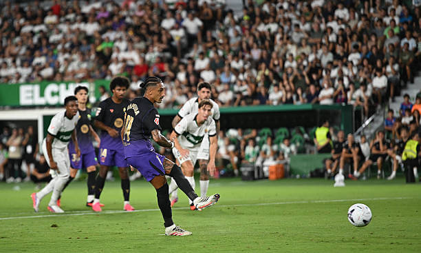 Elche vs Barcelona Review: Raphinha scores from the penalty spot during the LaLiga 2026/27 match between Elche and Barcelona at the Estadio Manuel Martinez Valero on August 23, 2026.