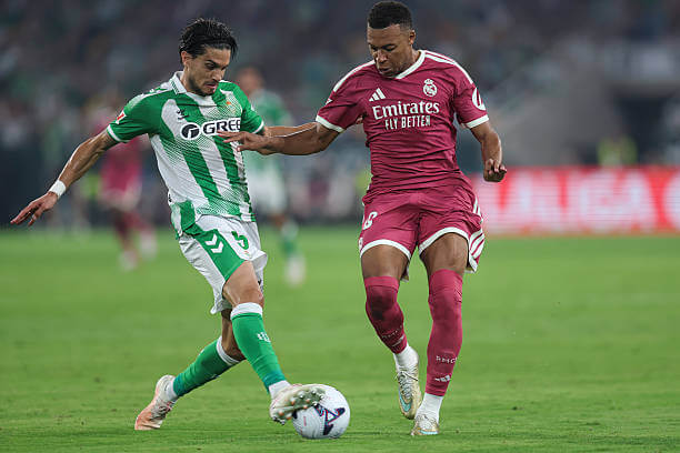 Betis vs Real Madrid Review: Kylian Mbappe and Marc Bartra in action during the LaLiga 2026/27 match between Real Betis and Real Madrid at Estadio La Cartuja on September 4, 2026.