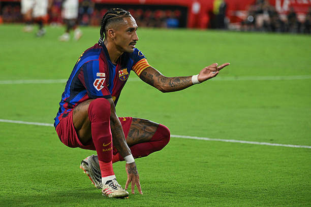 Sevilla vs Barcelona Review: Raphinha celebrates his third goal of the game during the LaLiga match between Sevilla and Barcelona at the Ramon Sanchez Pizjuan on September 19, 2026.