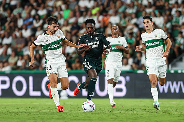 Elche vs Real Madrid Review: Vinicius Junior in action during the LaLiga match between Elche and Real Madrid at Estadio Manuel Martinez Valero on September 15, 2026.