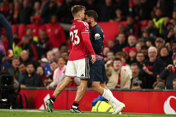 Manchester United vs Tottenham Review: Rodrigo Bentancur head butts Luke Shaw during the Premier League 2026/27 match between Manchester United and Tottenham at Old Trafford on October 10, 2026.