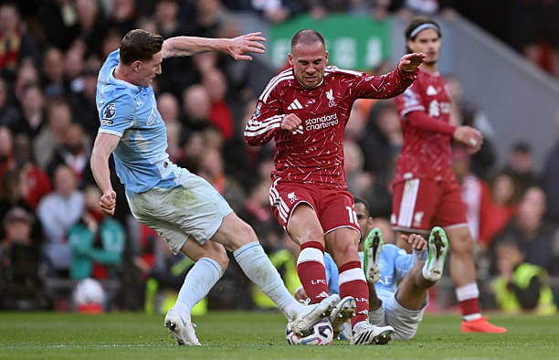 Liverpool vs Manchester City Review: Elliot Anderson and Alexis Mac Allister battle for possession during the Premier League 2026/27 match between Liverpool and Manchester City at Anfield on October 11, 2026.