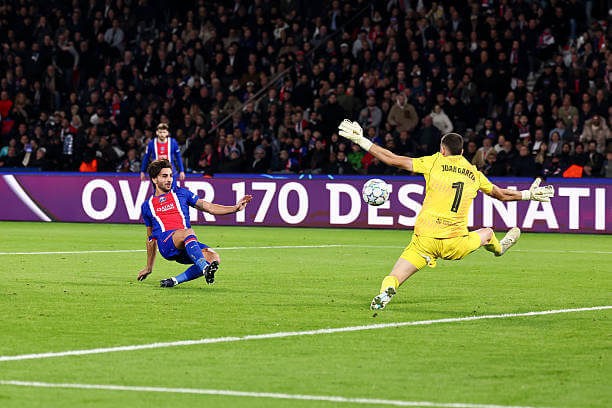 PSG vs Barcelona Review: Joan Garcia saves a shot from Ferran Torres during the UEFA Champions League 2026/27 League Phase MD3 match between PSG and Barcelona at Parc des Princes on October 20, 2026.
