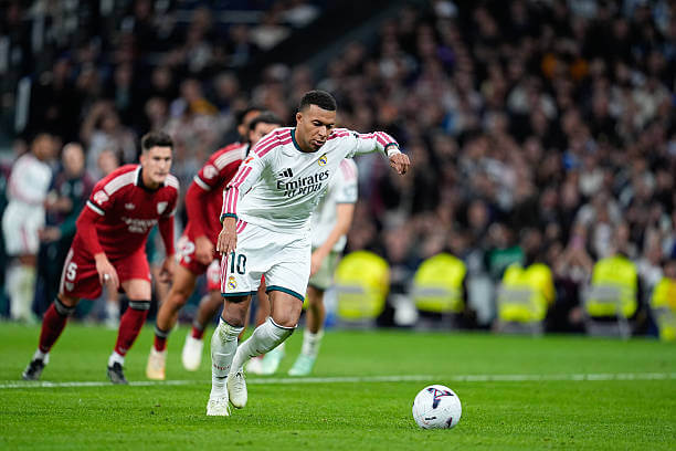 Real Madrid vs Sevilla Review: Kylian Mbappe scores from the penalty spot during the LaLiga 2026/27 match between Real Madrid and Sevilla at Estadio Santiago Bernabéu on October 18, 2026.