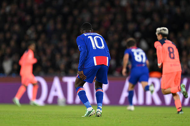 PSG vs Barcelona Review: Ousmane Dembele reacts after sustaining an injury during the UEFA Champions League 2026/27 League Phase MD3 match between PSG and Barcelona at Parc des Princes on October 20, 2026.