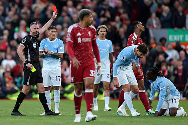 Liverpool vs Manchester City Review: Ryan Gravenberch receives a red card from referee Chris Kavanagh after getting a second yellow card during the Premier League 2026/27 match between Liverpool and Manchester City at Anfield on October 11, 2026.